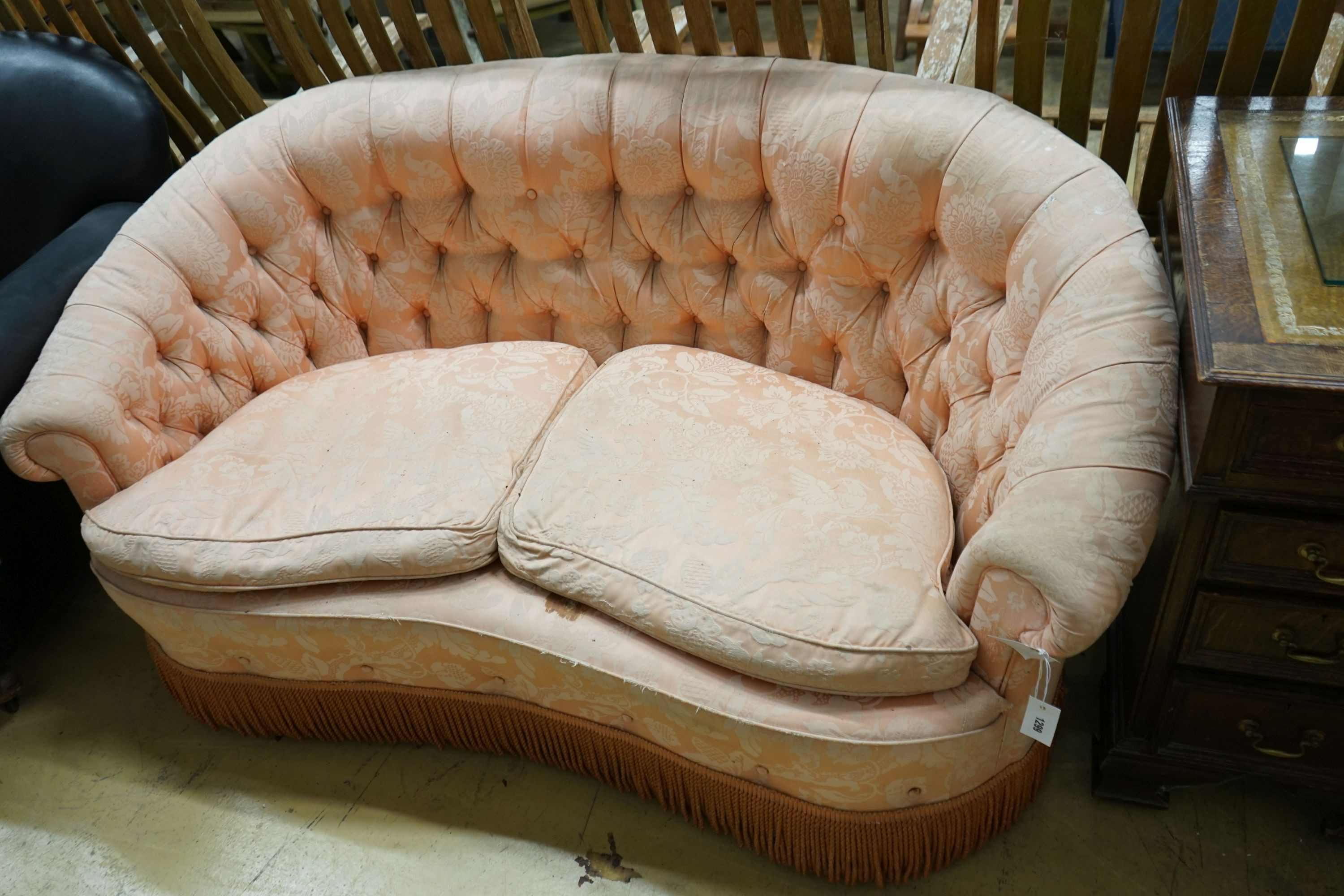 A mid century tub frame settee upholstered in buttoned pink damask, length 160cm, depth 76cm, height 76cm